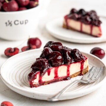Cherry Cheesecake is lush, velvety, and creamy finished with a heap of sweet homemade cherry sauce on top. The perfect summer dessert with cherries! | aheadofthyme.com