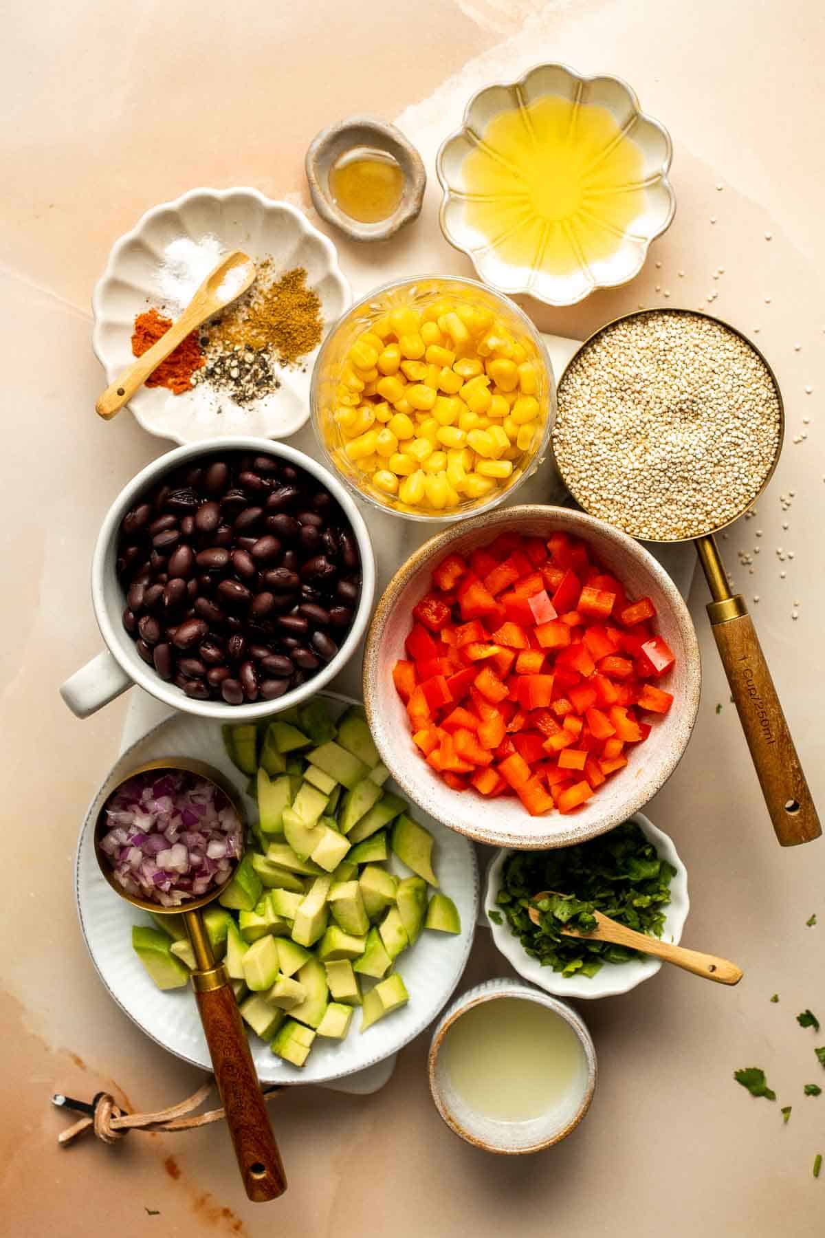 Southwest Quinoa Salad is hearty, flavorful, and delicious. It's loaded with chunky vegetables and tender quinoa, coated in a tangy homemade dressing. | aheadofthyme.com