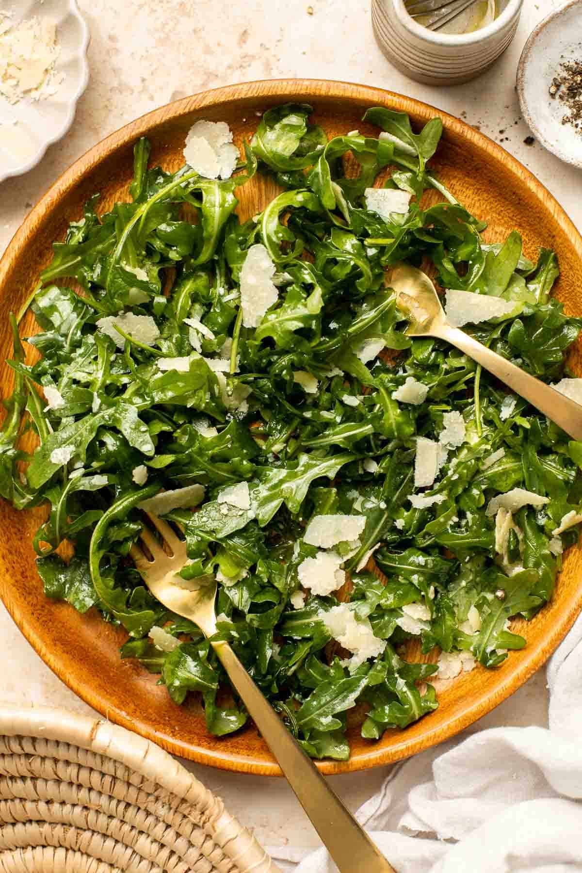 Arugula Salad with Parmesan cheese and a simple homemade lemon dressing is healthy, fresh, and delicious. Toss it together in just 5 minutes! | aheadofthyme.com