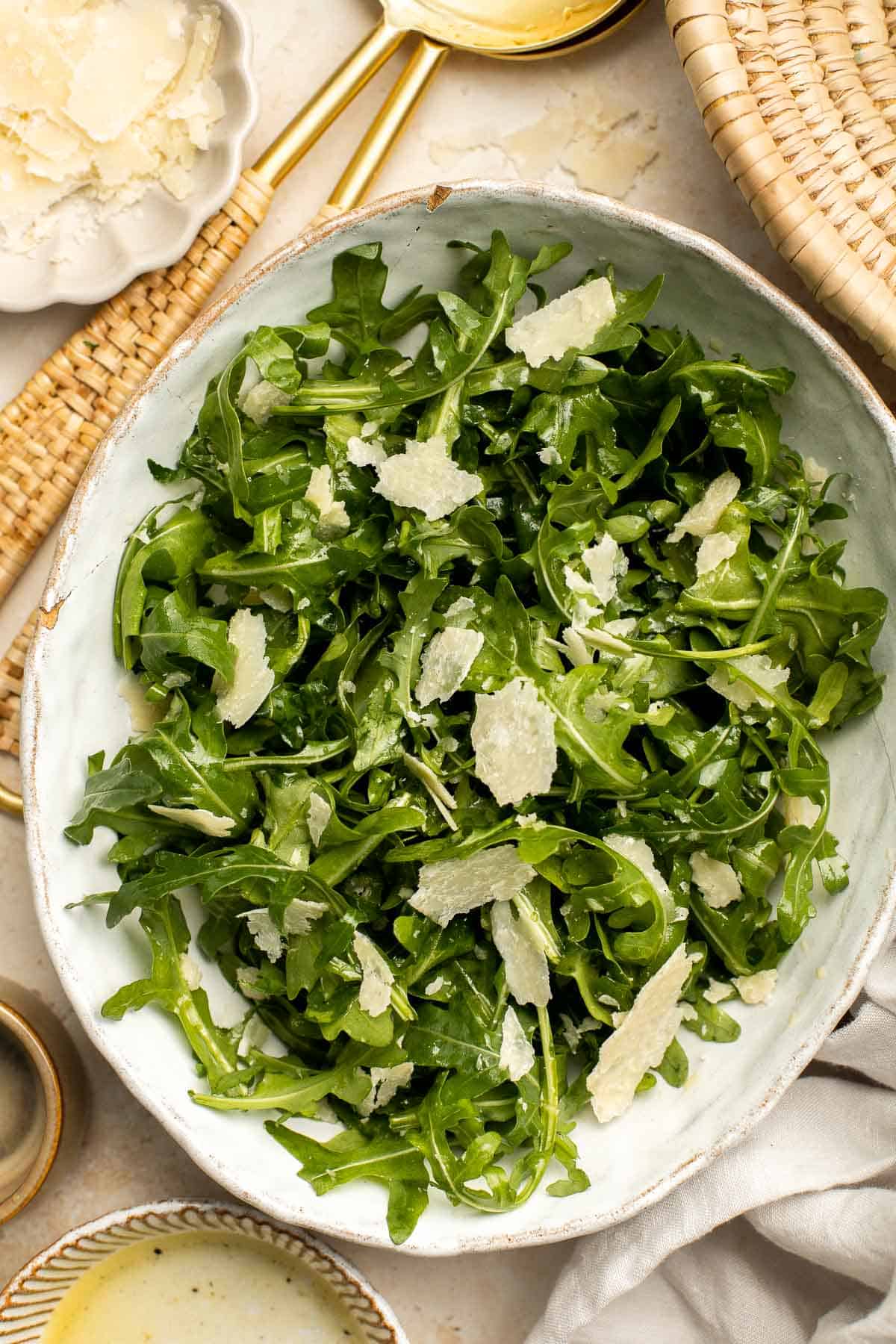 Arugula Salad with Parmesan cheese and a simple homemade lemon dressing is healthy, fresh, and delicious. Toss it together in just 5 minutes! | aheadofthyme.com