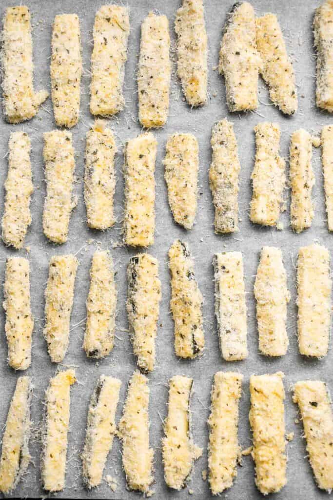 Baked Zucchini Fries are healthy, flavorful, and delicious. This summer vegetable is crispy on the outside while soft and creamy on the inside. | aheadofthyme.com