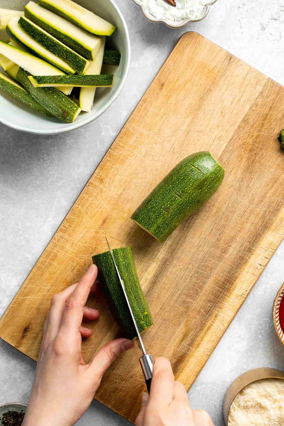 Baked Zucchini Fries are healthy, flavorful, and delicious. This summer vegetable is crispy on the outside while soft and creamy on the inside. | aheadofthyme.com