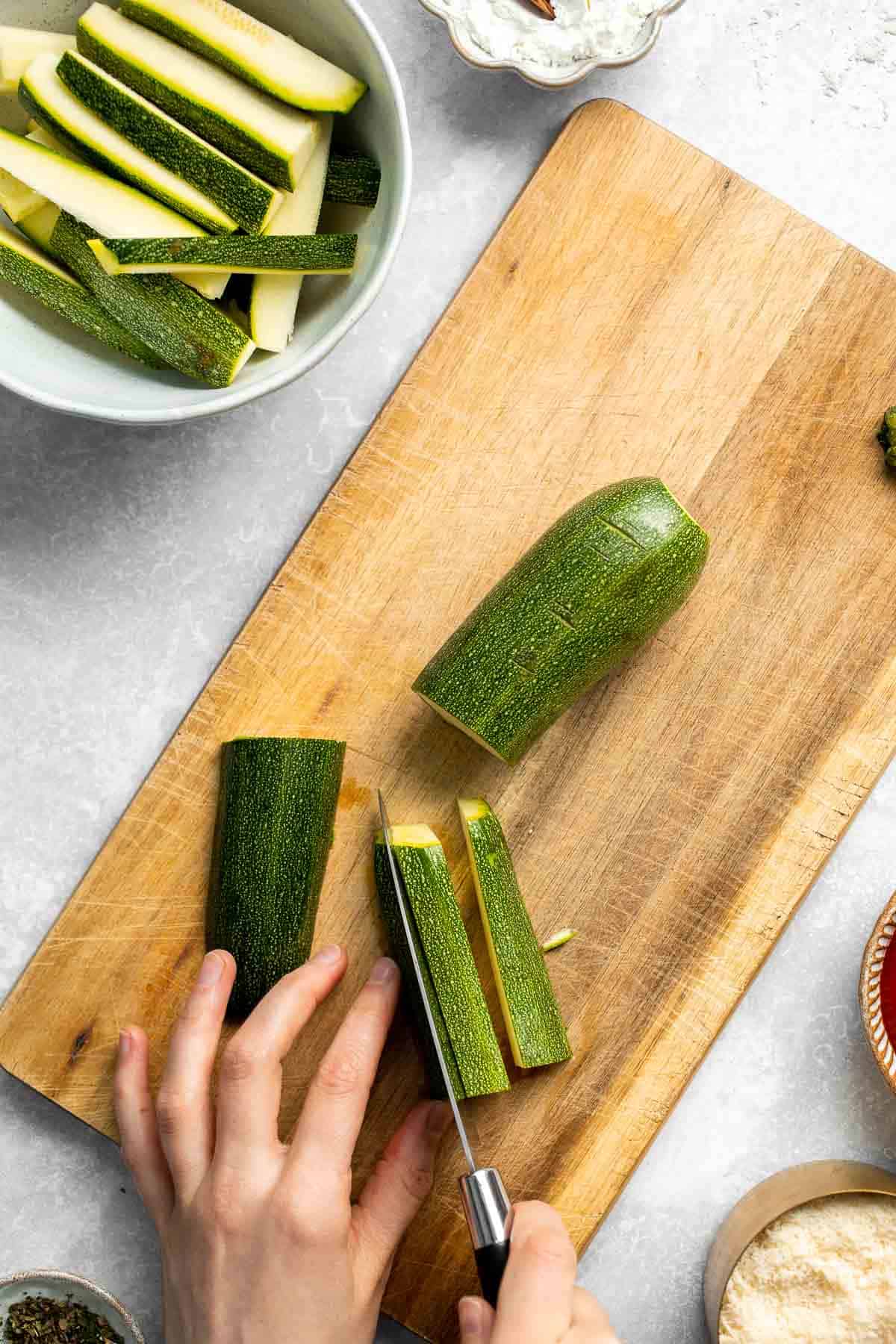 Baked Zucchini Fries are healthy, flavorful, and delicious. This summer vegetable is crispy on the outside while soft and creamy on the inside. | aheadofthyme.com