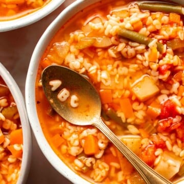 Homemade Alphabet Soup will quickly become a family favorite with its hearty vegetables and fun alphabet noodles. It's quick and easy to make in 30 minutes. | aheadofthyme.com