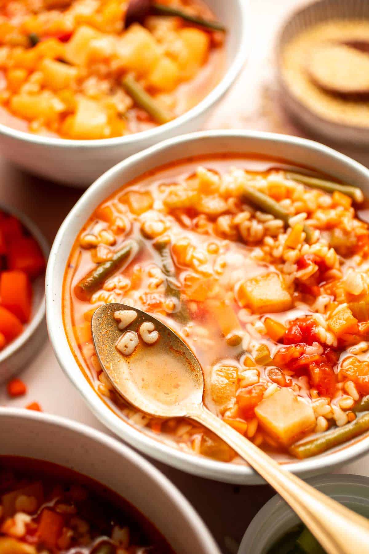 Homemade Alphabet Soup will quickly become a family favorite with its hearty vegetables and fun alphabet noodles. It's quick and easy to make in 30 minutes. | aheadofthyme.com