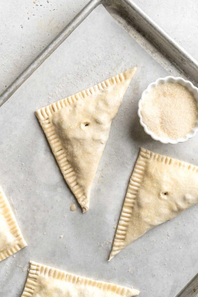 With a buttery, flaky crust and spiced sweet apple filling, these homemade Apple Turnovers are hands down one of the best ways to enjoy this seasonal fruit. | aheadofthyme.com