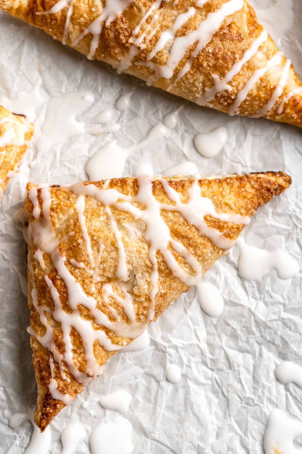 With a buttery, flaky crust and spiced sweet apple filling, these homemade Apple Turnovers are hands down one of the best ways to enjoy this seasonal fruit. | aheadofthyme.com