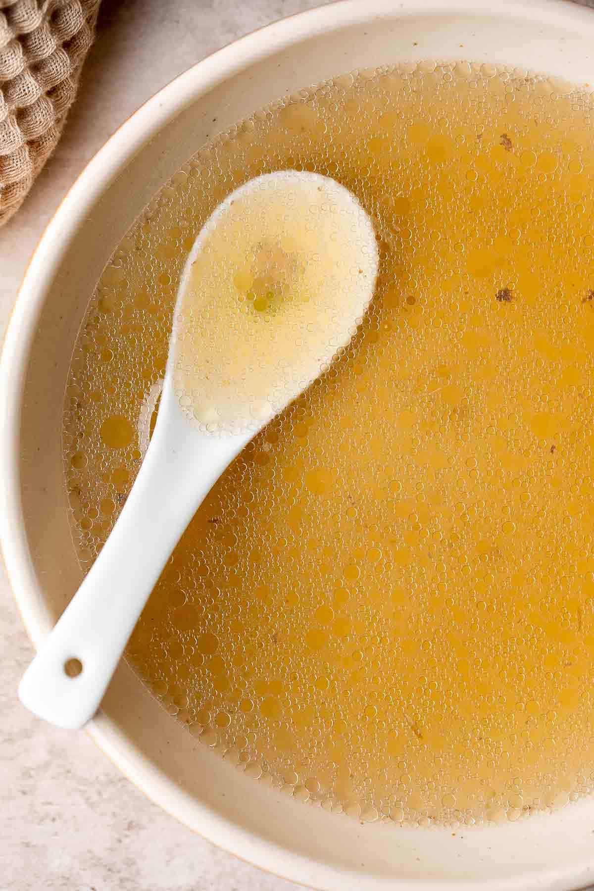 This Asian Beef Broth is the perfect base for your noodle soups, stews, and braises. It's light yet flavorful with just the right amount of umami. | aheadofthyme.com