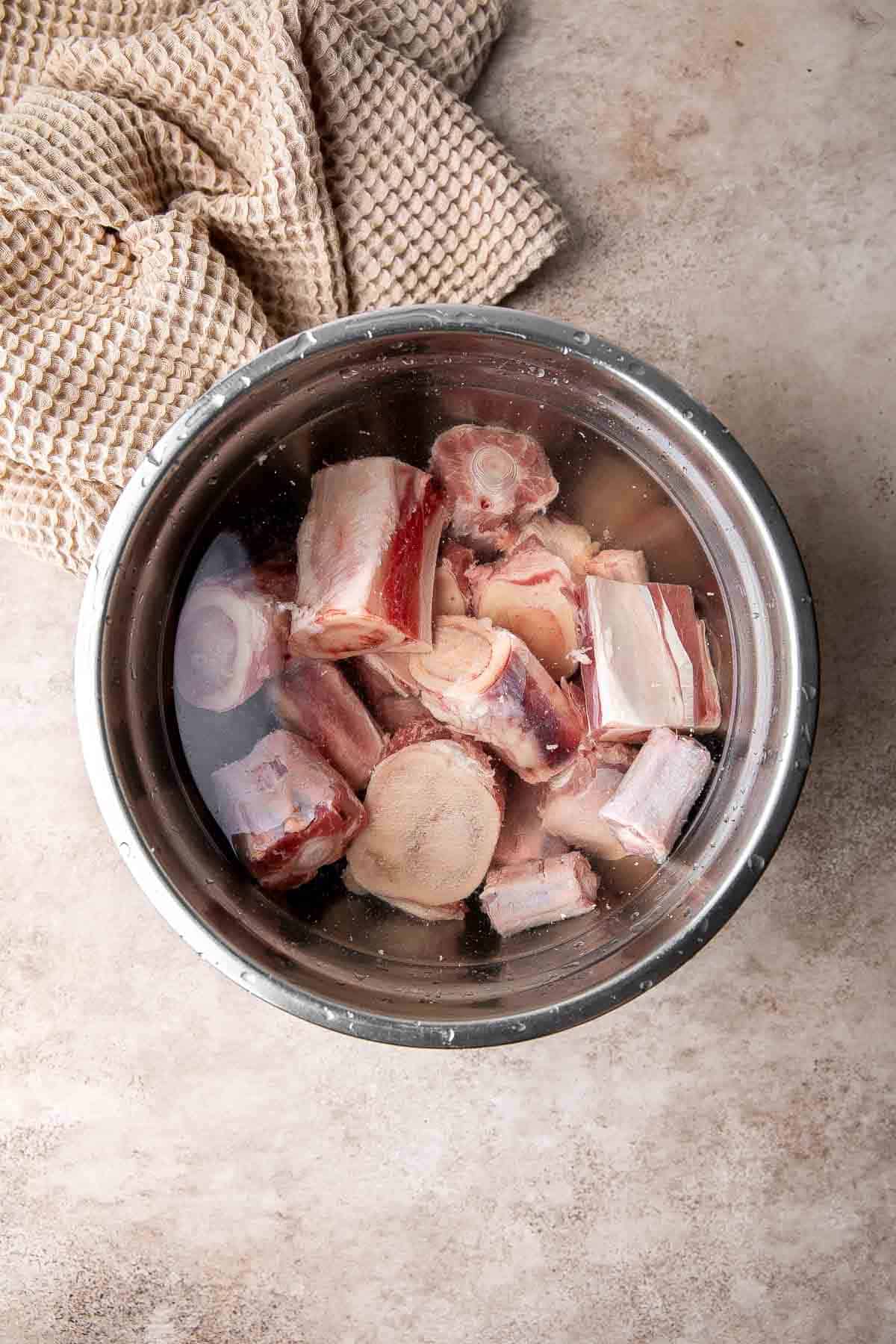 This Asian Beef Broth is the perfect base for your noodle soups, stews, and braises. It's light yet flavorful with just the right amount of umami. | aheadofthyme.com