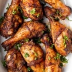 Baked Chicken Drumsticks are ideal for busy weeknights. Marinate inexpensive chicken legs with everyday spices and bake until crispy, tender, and flavorful. | aheadofthyme.com