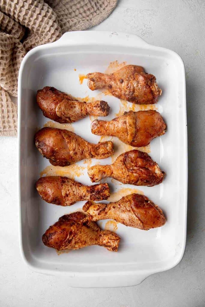 Baked Chicken Drumsticks are ideal for busy weeknights. Marinate inexpensive chicken legs with everyday spices and bake until crispy, tender, and flavorful. | aheadofthyme.com