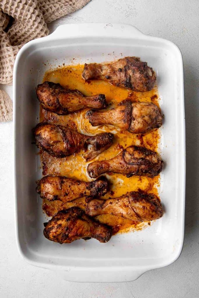 Baked Chicken Drumsticks are ideal for busy weeknights. Marinate inexpensive chicken legs with everyday spices and bake until crispy, tender, and flavorful. | aheadofthyme.com