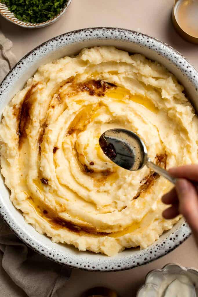Brown Butter Mashed Potatoes are the ultimate side dish for any meal. It’s smooth and creamy with a rich, nutty flavor from the brown butter. | aheadofthyme.com