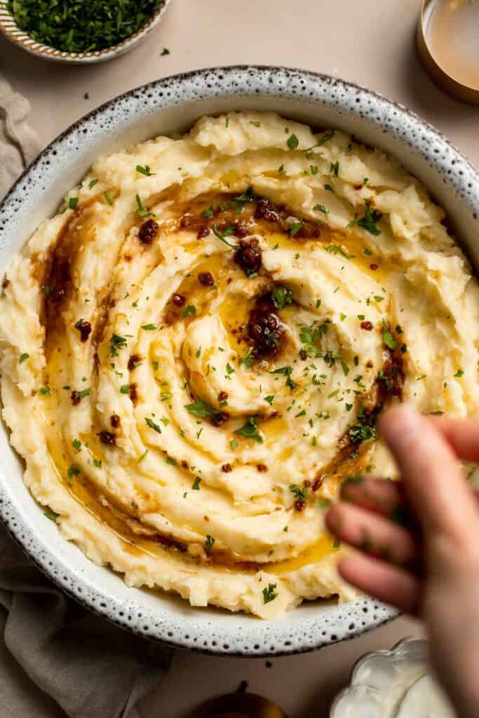 Brown Butter Mashed Potatoes are the ultimate side dish for any meal. It’s smooth and creamy with a rich, nutty flavor from the brown butter. | aheadofthyme.com