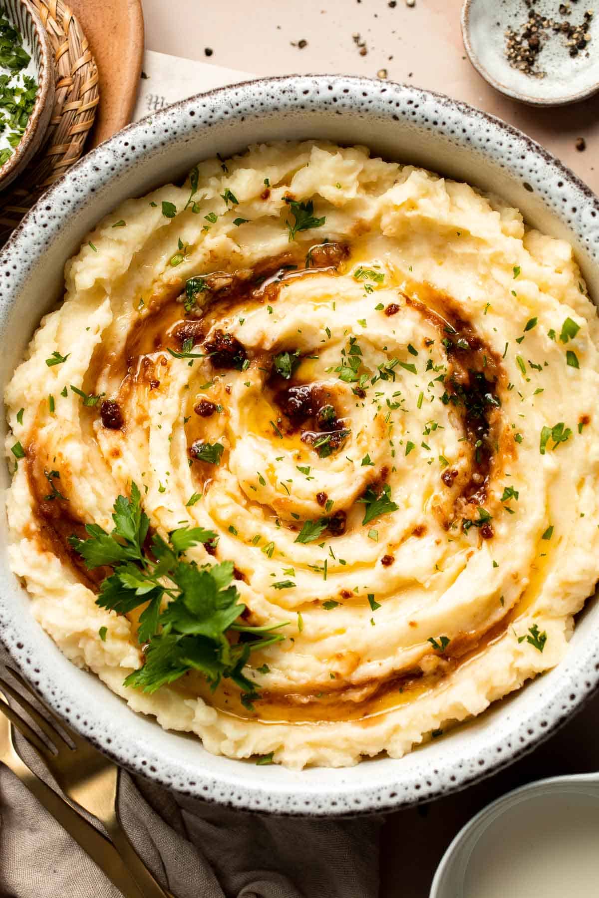 Brown Butter Mashed Potatoes are the ultimate side dish for any meal. It’s smooth and creamy with a rich, nutty flavor from the brown butter. | aheadofthyme.com