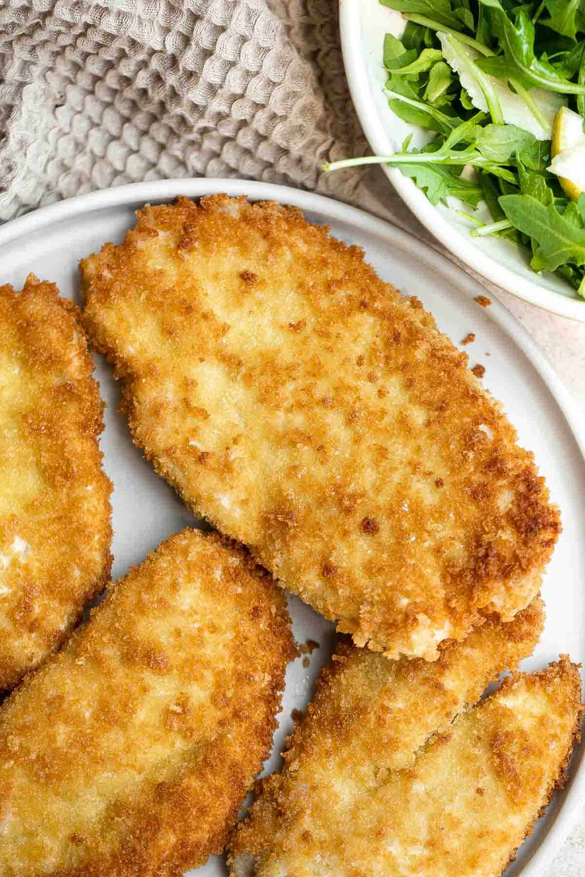Chicken Milanese is an Italian classic that is crispy, juicy, and easy to make. Lightly breaded chicken cutlets are pan-fried until crispy and golden. | aheadofthyme.com