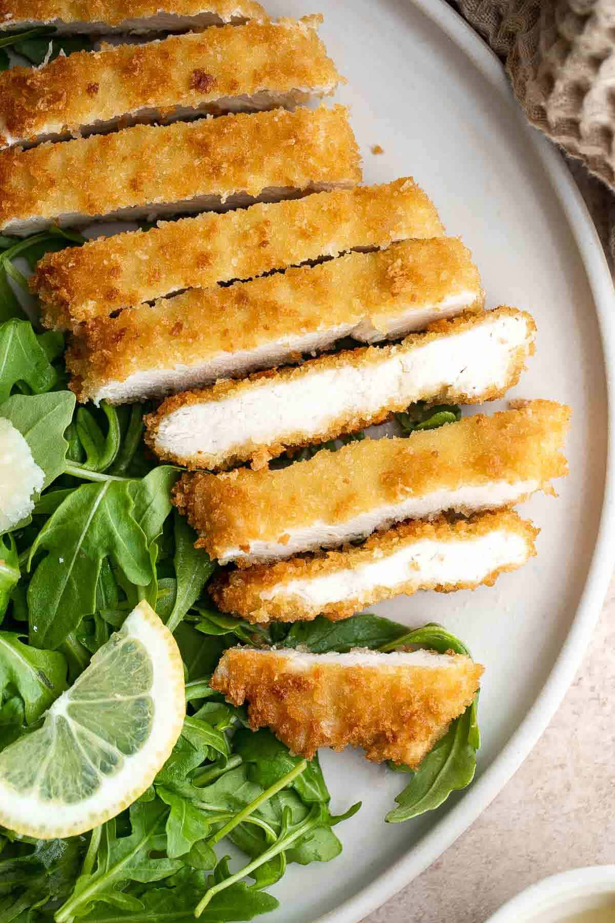 Chicken Milanese is an Italian classic that is crispy, juicy, and easy to make. Lightly breaded chicken cutlets are pan-fried until crispy and golden. | aheadofthyme.com