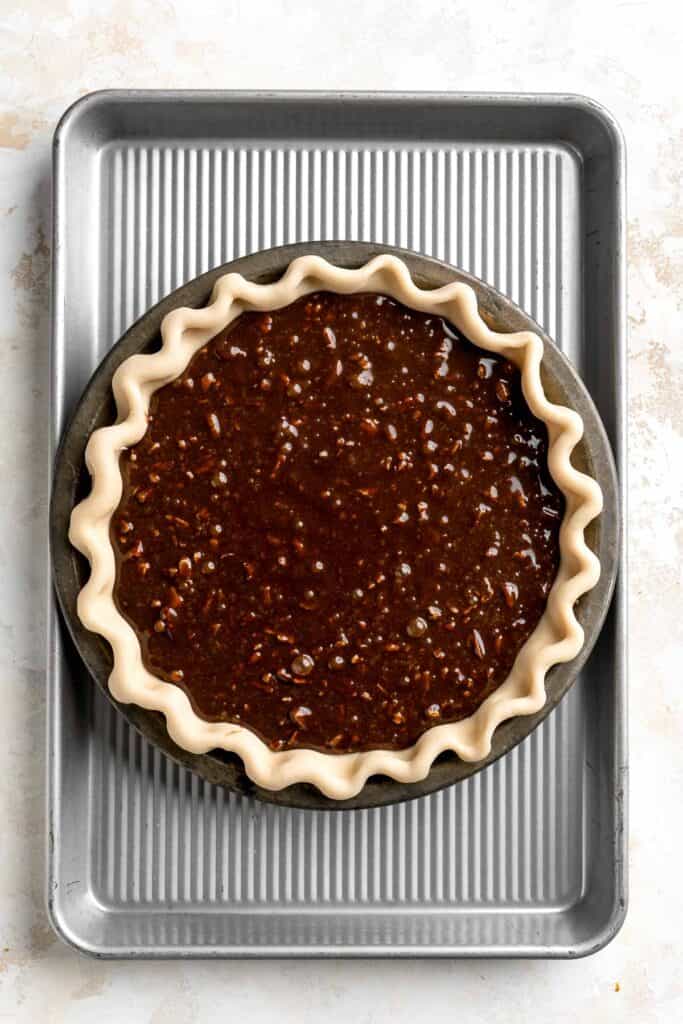 This decadent Chocolate Pecan Pie is a twist on the classic holiday pie with a rich, dark chocolate flavor that pairs wonderfully with toasted pecans. | aheadofthyme.com
