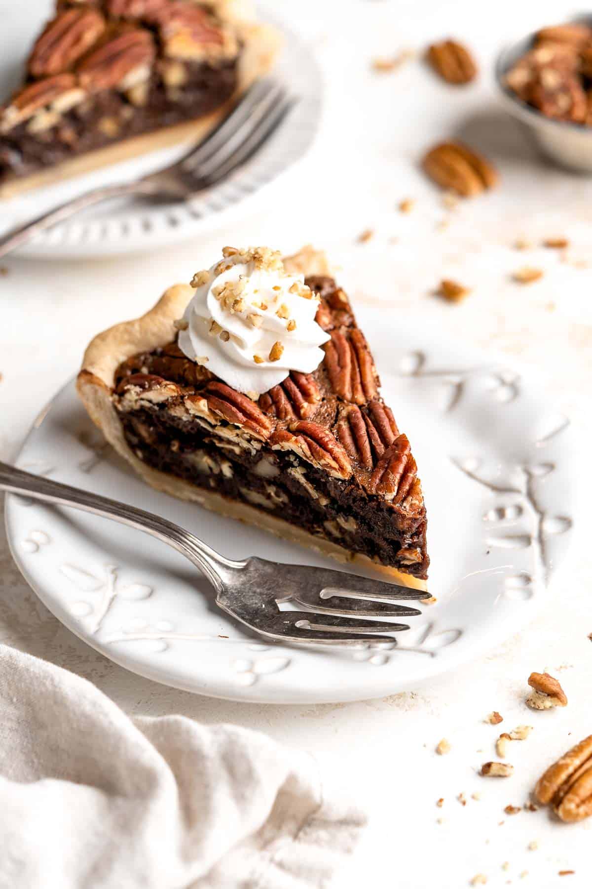 This decadent Chocolate Pecan Pie is a twist on the classic holiday pie with a rich, dark chocolate flavor that pairs wonderfully with toasted pecans. | aheadofthyme.com