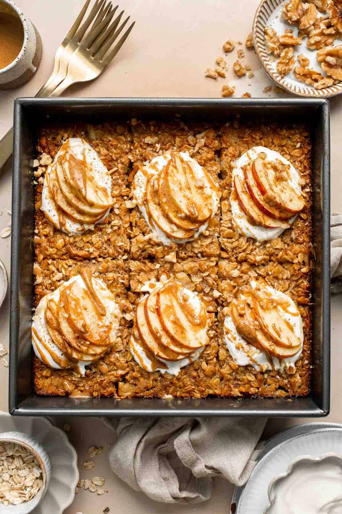 Cinnamon Apple Baked Oatmeal is a delicious, filling make-ahead breakfast for fall — loaded with chewy oats, tender apples, crunchy walnuts, and cinnamon. | aheadofthyme.com