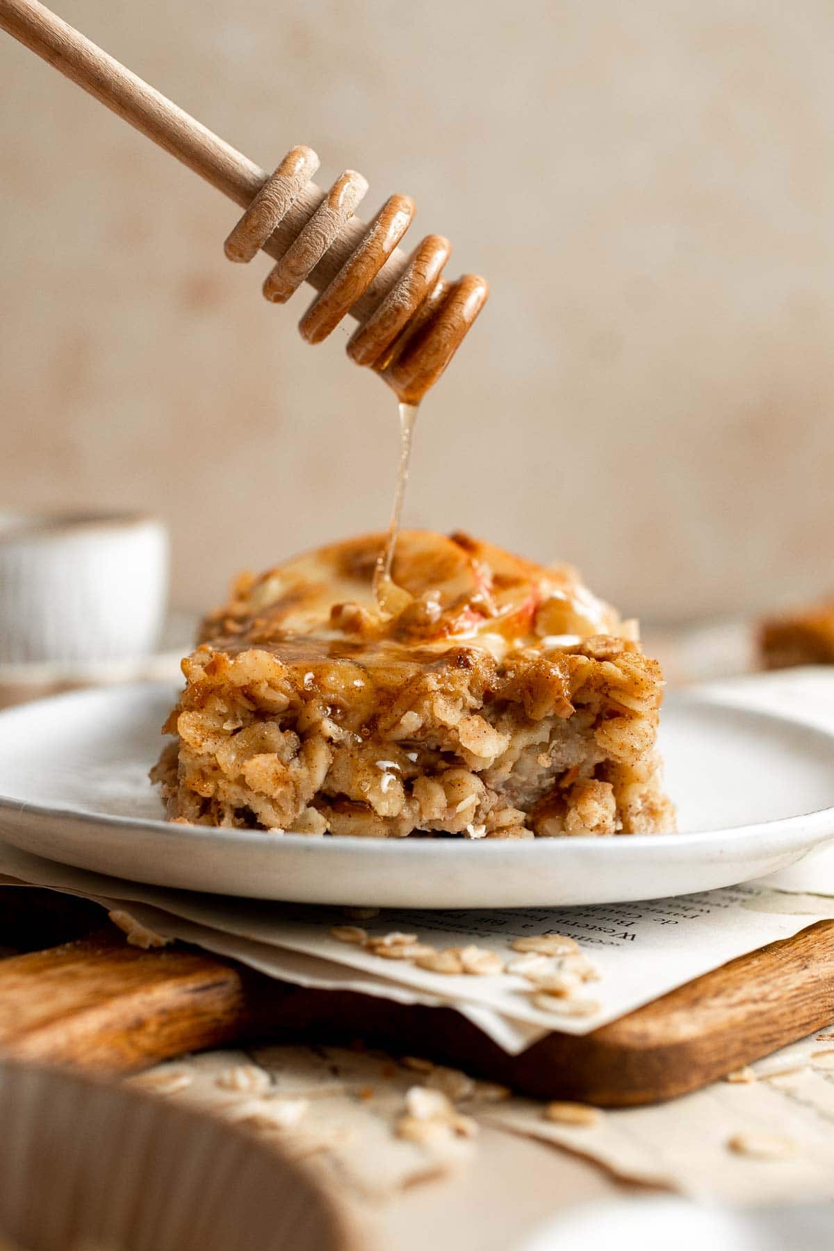 Cinnamon Apple Baked Oatmeal is a delicious, filling make-ahead breakfast for fall — loaded with chewy oats, tender apples, crunchy walnuts, and cinnamon. | aheadofthyme.com