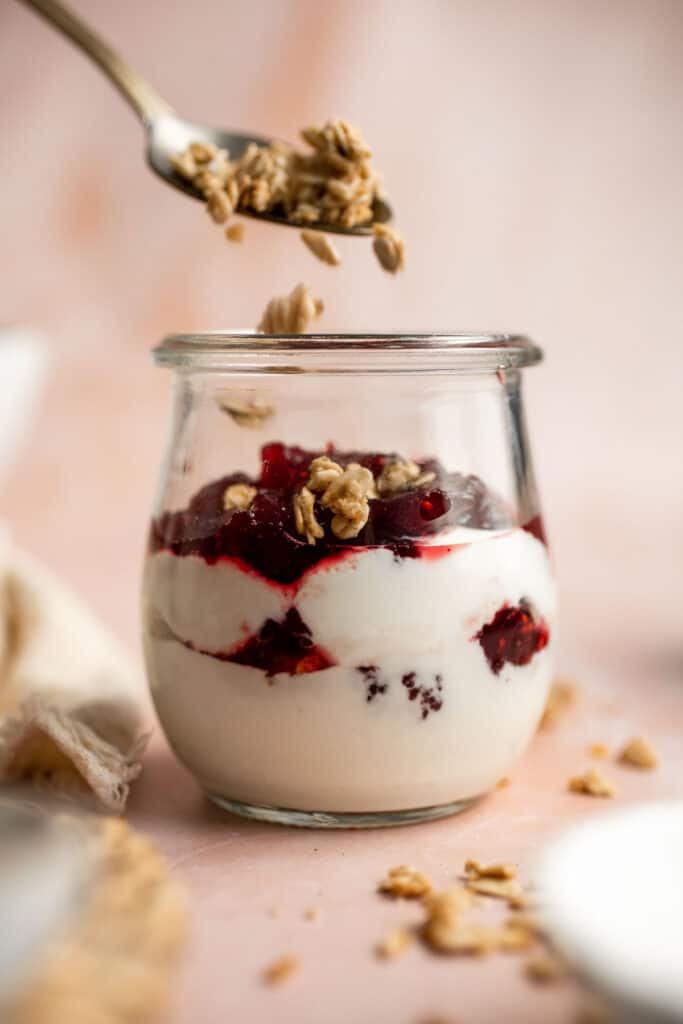 This Cranberry Sauce Parfait is a light, creamy, and delightful breakfast or dessert during the holidays. A great way to use leftover cranberry sauce! | aheadofthyme.com