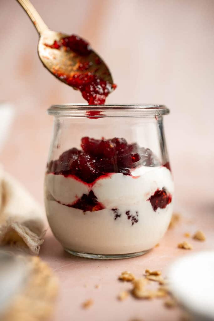 This Cranberry Sauce Parfait is a light, creamy, and delightful breakfast or dessert during the holidays. A great way to use leftover cranberry sauce! | aheadofthyme.com