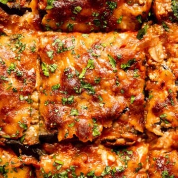 This Eggplant Lasagna is cheesy, saucy, and packed with layers of roasted eggplant, mushrooms, and melty cheese. It's gluten-free and vegetarian too. | aheadofthyme.com