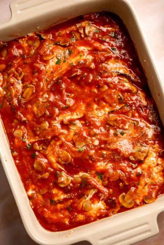 This Eggplant Lasagna is cheesy, saucy, and packed with layers of roasted eggplant, mushrooms, and melty cheese. It's gluten-free and vegetarian too. | aheadofthyme.com