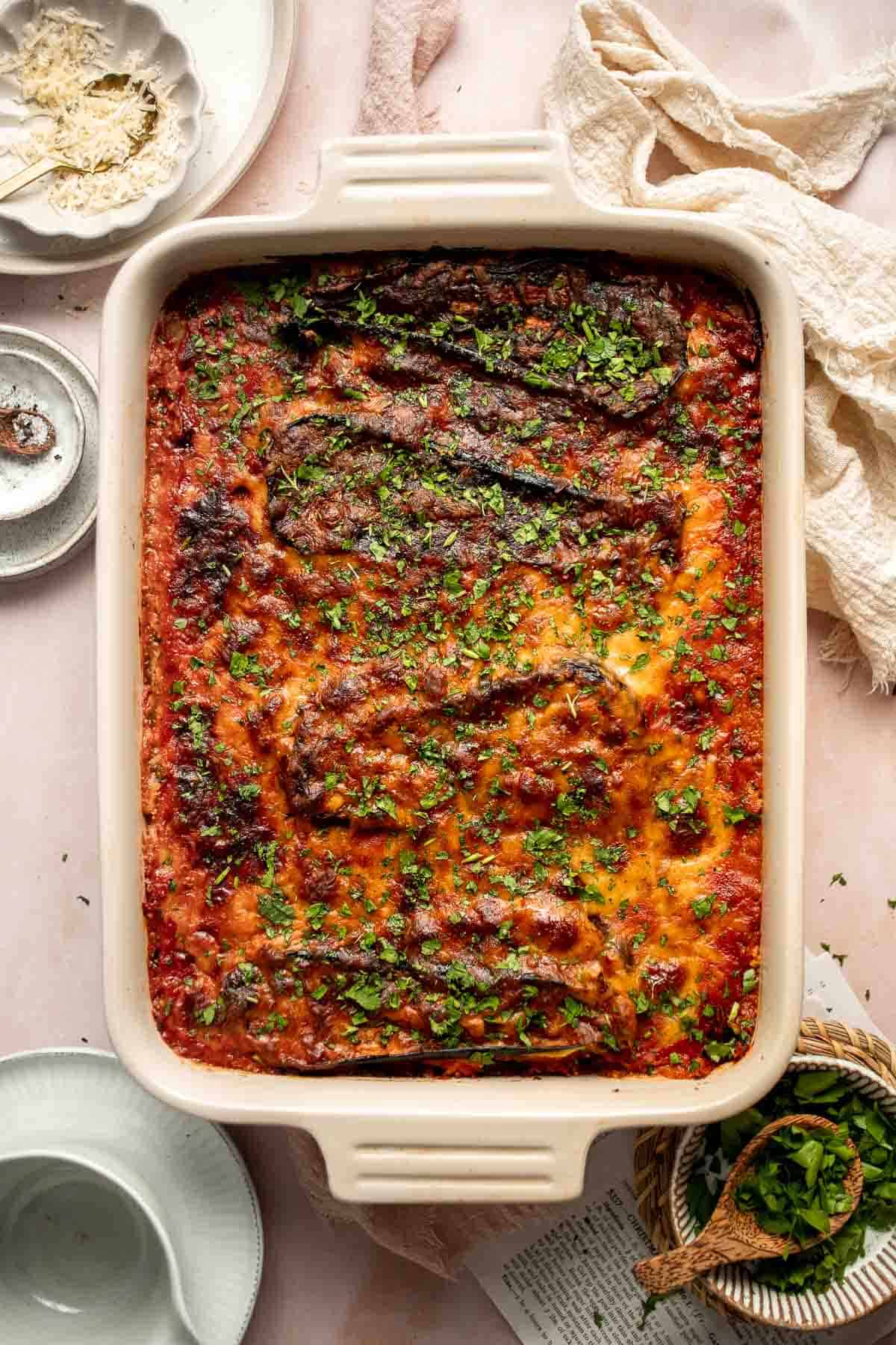 This Eggplant Lasagna is cheesy, saucy, and packed with layers of roasted eggplant, mushrooms, and melty cheese. It's gluten-free and vegetarian too. | aheadofthyme.com
