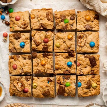 Stretch your Halloween treats with these chewy and delicious Leftover Halloween Candy Cookie Bars. A great way to finish up any leftover candy! | aheadofthyme.com