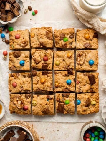Stretch your Halloween treats with these chewy and delicious Leftover Halloween Candy Cookie Bars. A great way to finish up any leftover candy! | aheadofthyme.com