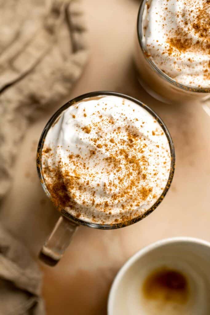 Pumpkin Spice Latte is an iconic Starbucks coffee drink that you can make cheaper at home with just a handle of simple ingredients including real pumpkin. | aheadofthyme.com