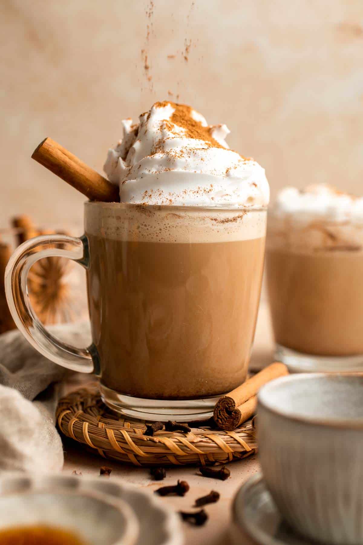Pumpkin Spice Latte is an iconic Starbucks coffee drink that you can make cheaper at home with just a handle of simple ingredients including real pumpkin. | aheadofthyme.com