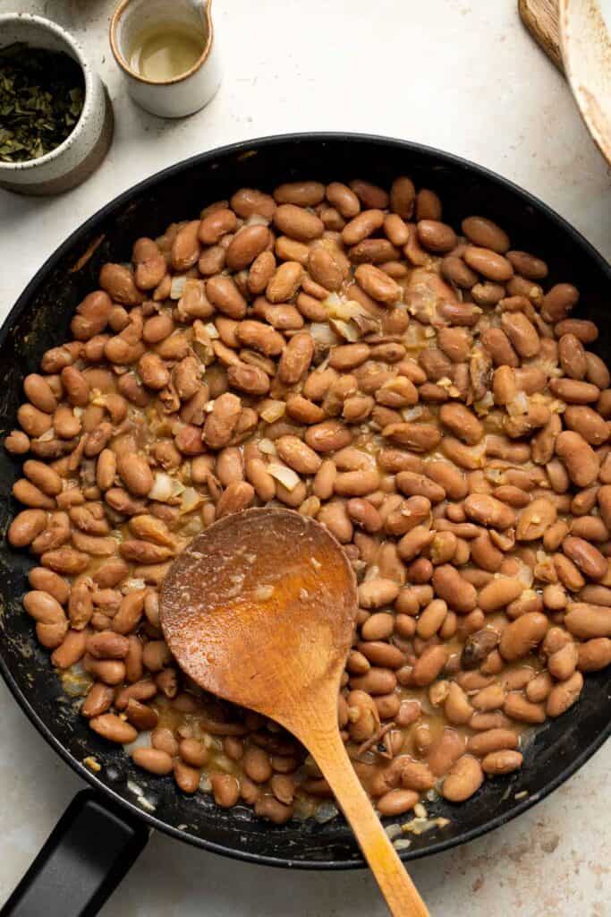 Homemade Refried Beans are simple, easy to make, and taste better than store-bought refried beans by a mile. They are creamy, chunky, and delicious! | aheadofthyme.com