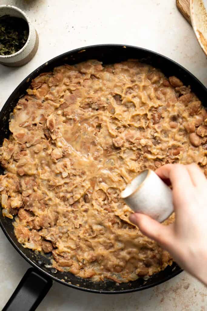 Homemade Refried Beans are simple, easy to make, and taste better than store-bought refried beans by a mile. They are creamy, chunky, and delicious! | aheadofthyme.com