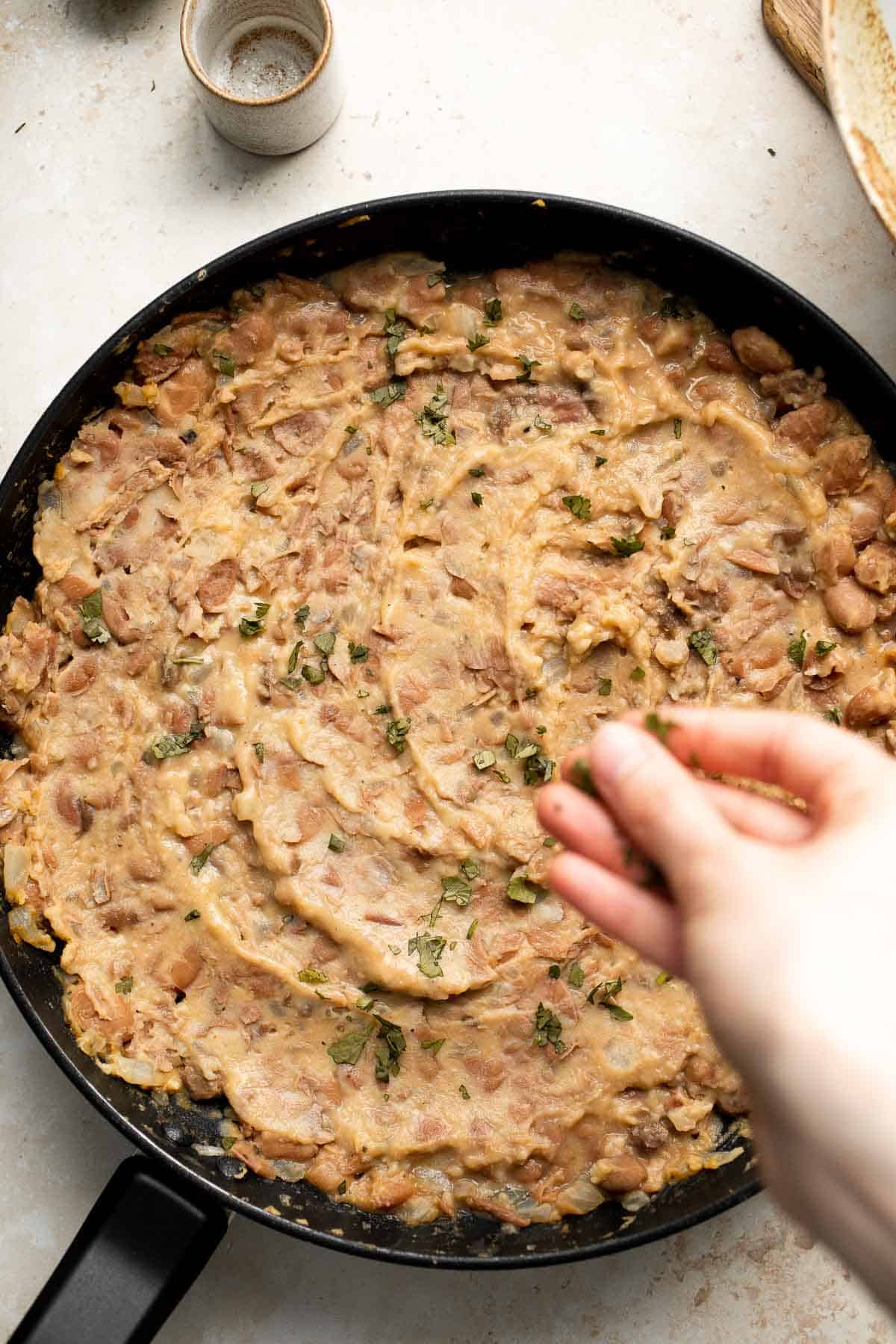 Homemade Refried Beans are simple, easy to make, and taste better than store-bought refried beans by a mile. They are creamy, chunky, and delicious! | aheadofthyme.com