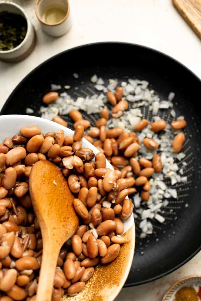 Homemade Refried Beans are simple, easy to make, and taste better than store-bought refried beans by a mile. They are creamy, chunky, and delicious! | aheadofthyme.com