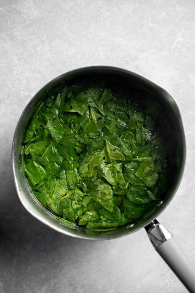 This buttery, garlicky Sautéed Spinach is the best way to enjoy this nutritious green. It's the ultimate healthy side dish and takes a few minutes to make! | aheadofthyme.com