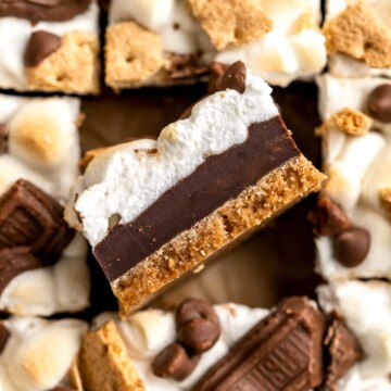 S'mores Bars are a delicious twist on the classic campfire dessert with delicious layers of graham crackers, chocolate, and marshmallows. | aheadofthyme.com