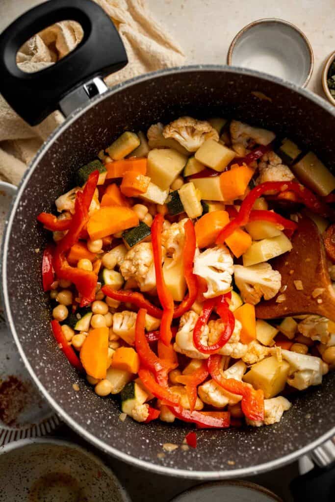 This Vegetable Curry is a quick, delicious, and nutritious meal for the whole family to enjoy — loaded with veggies and chickpeas in a homemade curry sauce. | aheadofthyme.com