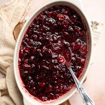 This Baked Cranberry Sauce recipe is an easy way to make a classic Thanksgiving side dish in the oven using 4 ingredients. It is thick, tart, and sweet. | aheadofthyme.com