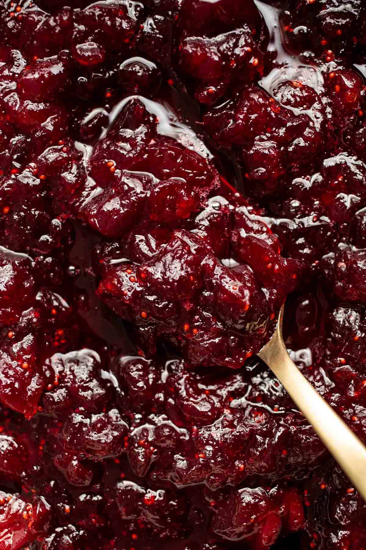 This Baked Cranberry Sauce recipe is an easy way to make a classic Thanksgiving side dish in the oven using 4 ingredients. It is thick, tart, and sweet. | aheadofthyme.com