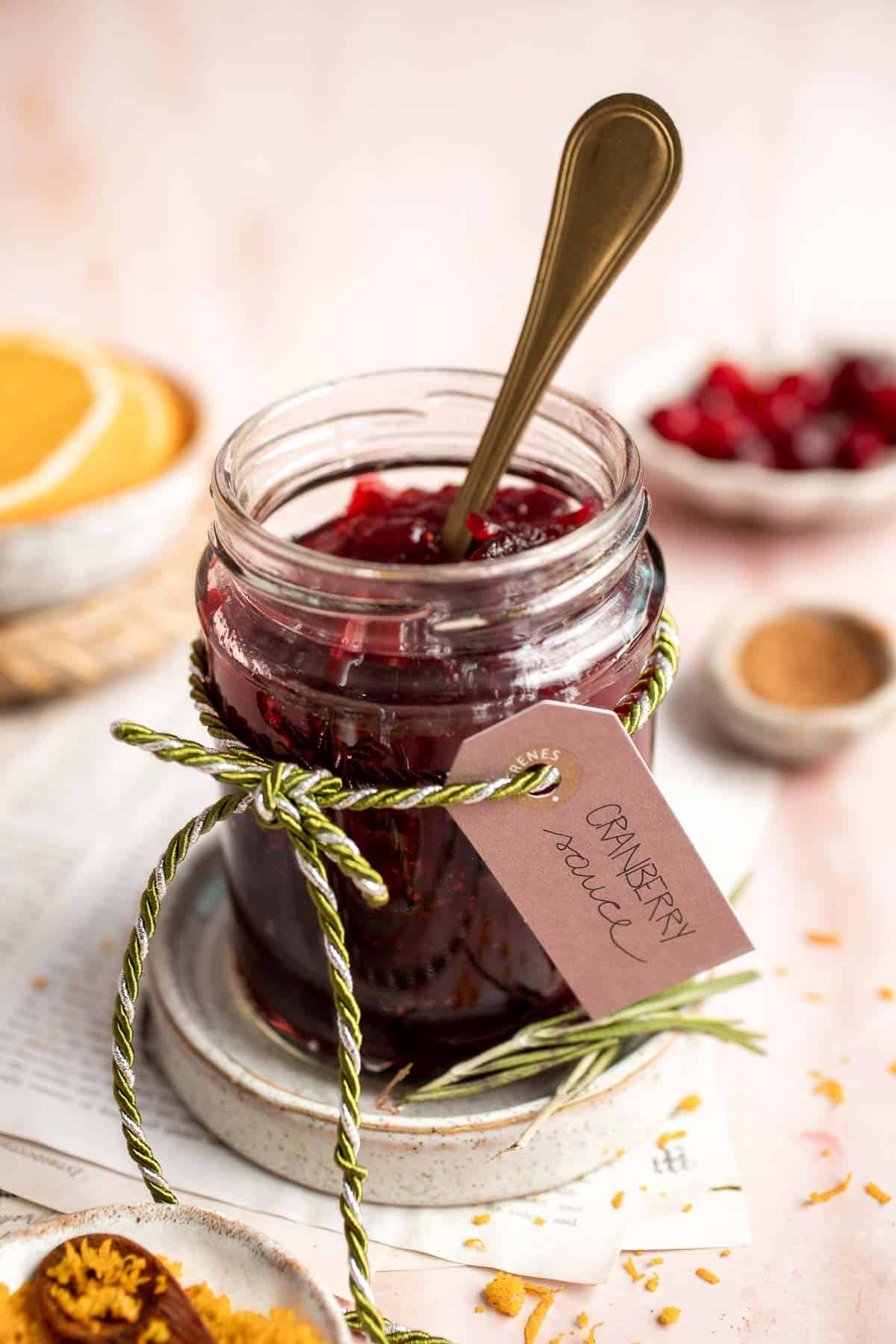 This Baked Cranberry Sauce recipe is an easy way to make a classic Thanksgiving side dish in the oven using 4 ingredients. It is thick, tart, and sweet. | aheadofthyme.com