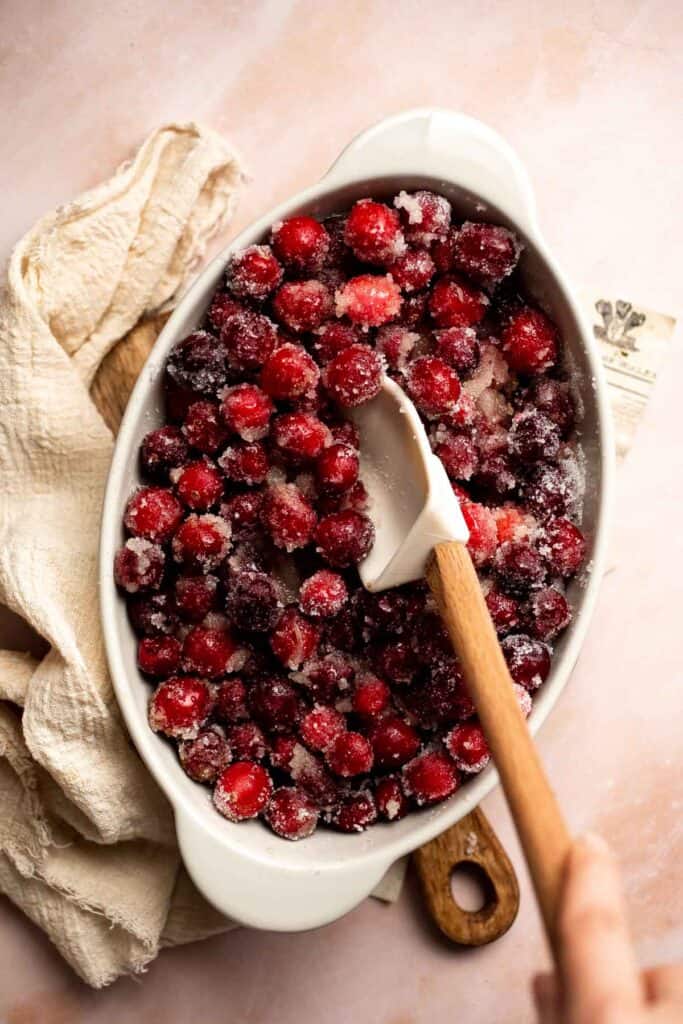 This Baked Cranberry Sauce recipe is an easy way to make a classic Thanksgiving side dish in the oven using 4 ingredients. It is thick, tart, and sweet. | aheadofthyme.com