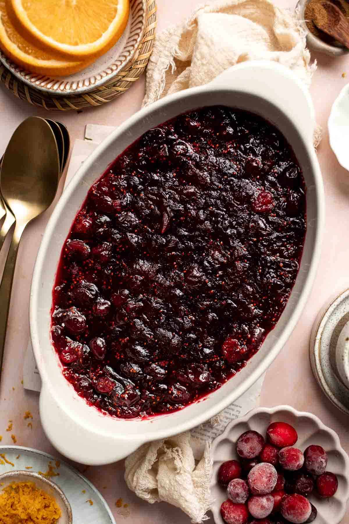 This Baked Cranberry Sauce recipe is an easy way to make a classic Thanksgiving side dish in the oven using 4 ingredients. It is thick, tart, and sweet. | aheadofthyme.com