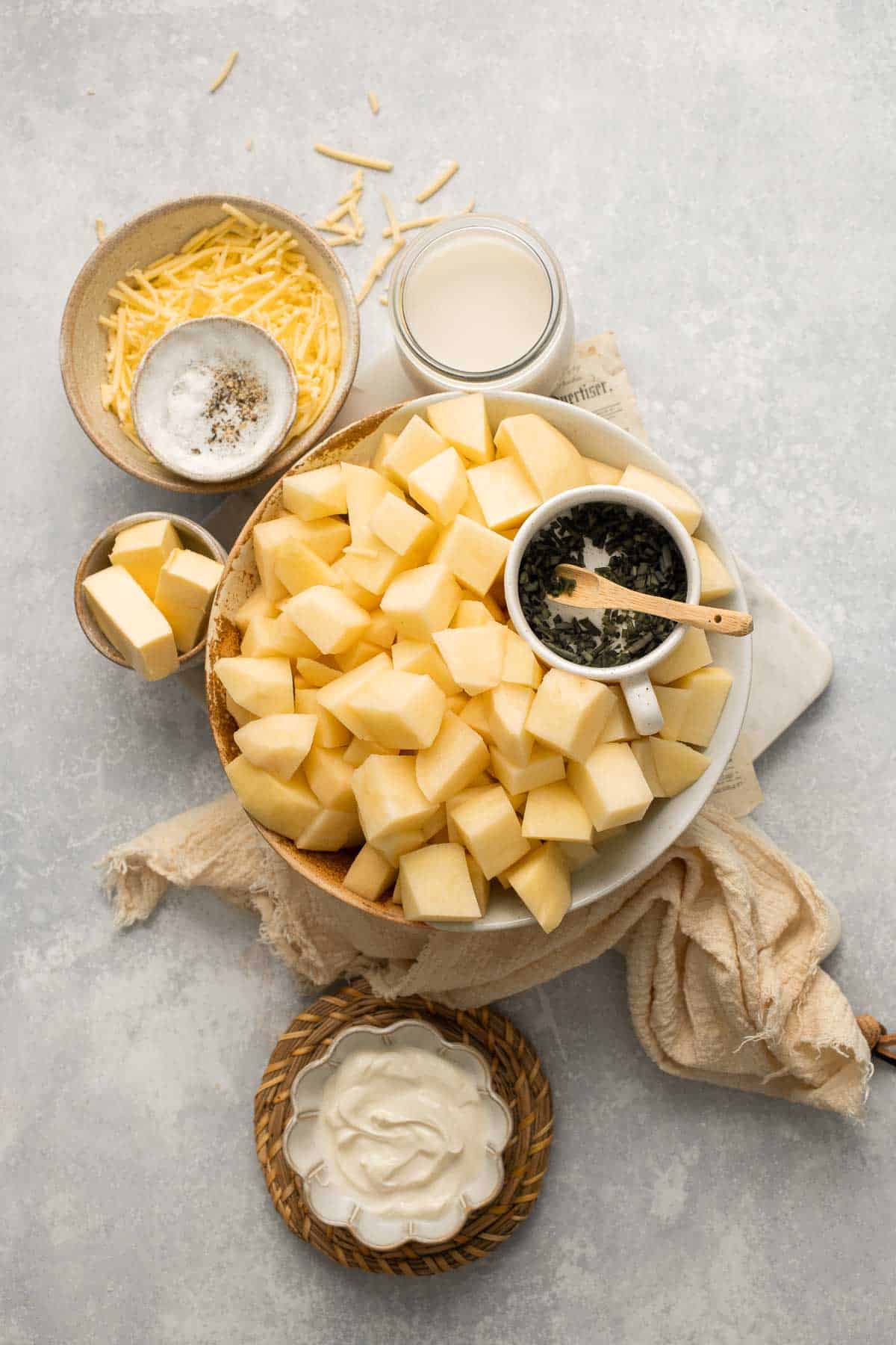 Baked Mashed Potatoes are buttery, cheesy, and crispy on the outside. Topped with chives and served warm, this side dish that will change your hosting game. | aheadofthyme.com