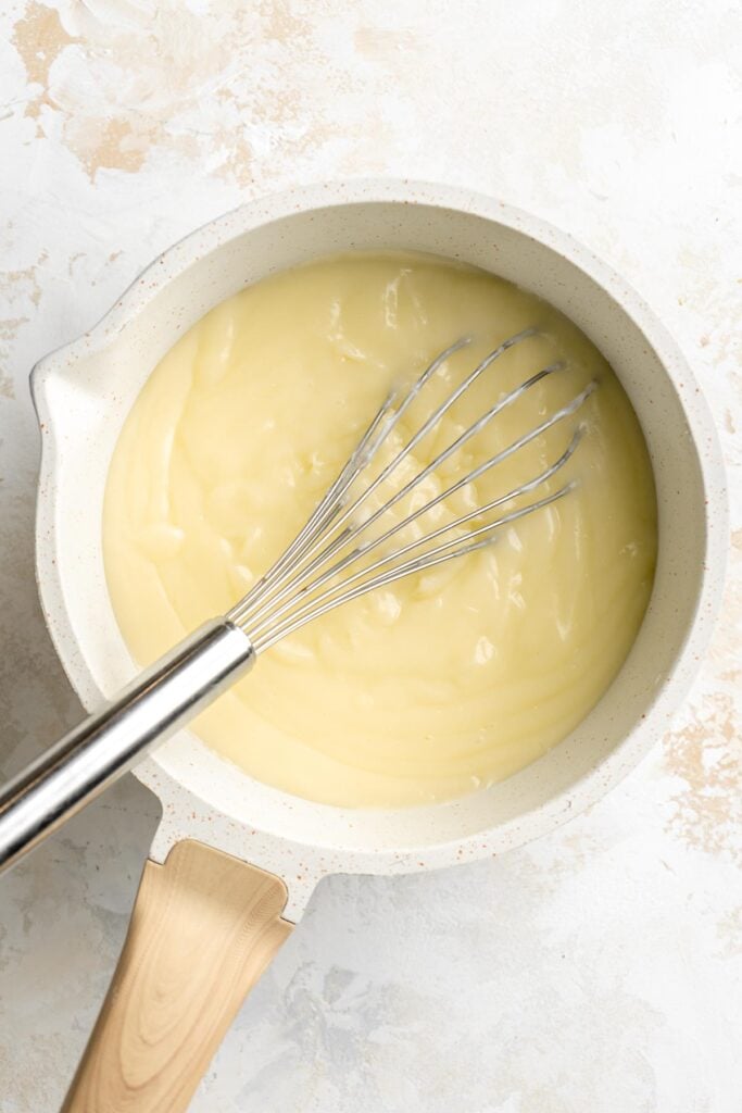 Homemade Banana Cream Pie is endlessly creamy with a buttery, flaky pie crust, a dreamy homemade vanilla custard, fresh banana slices, and whipped cream. | aheadofthyme.com