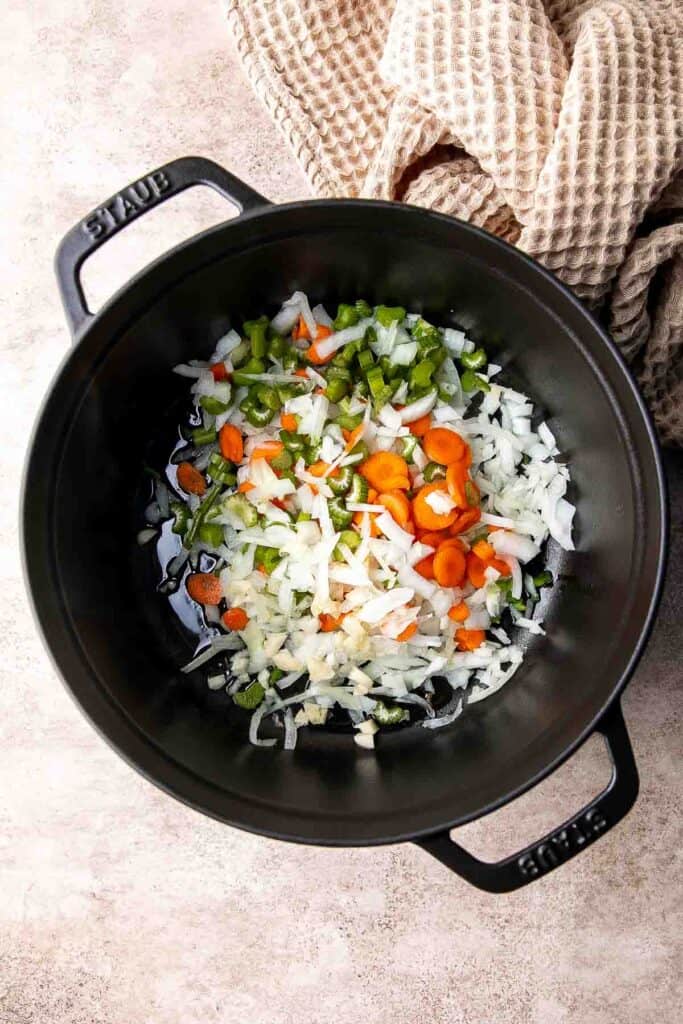 This Black Bean Soup is hearty, healthy, and cozy — everything you want in a soup! It's loaded with black beans, spices, and your favorite Mexican toppings. | aheadofthyme.com