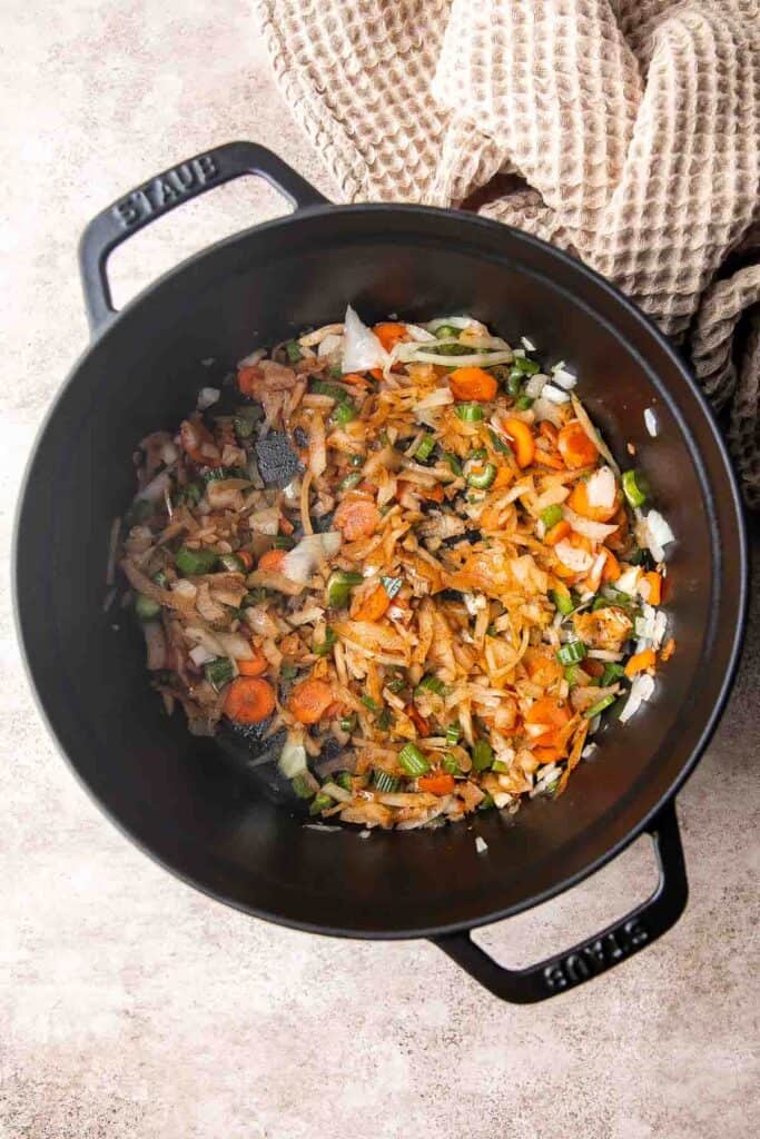 This Black Bean Soup is hearty, healthy, and cozy — everything you want in a soup! It's loaded with black beans, spices, and your favorite Mexican toppings. | aheadofthyme.com